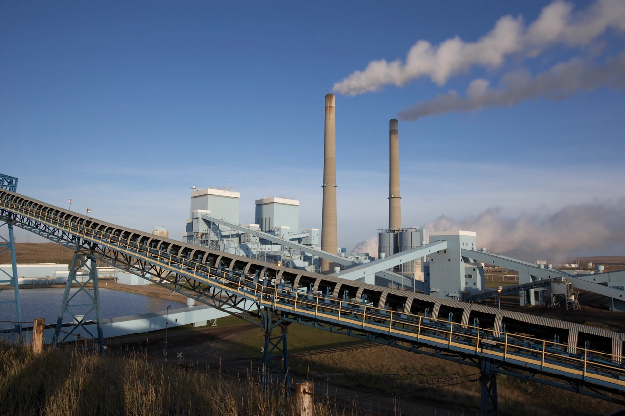 Industrial power plant with smokestacks