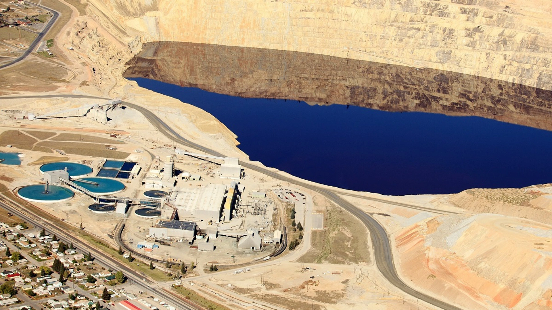 An aerial view of the evaporation pond and water treatment facilities at an open pit copper mine