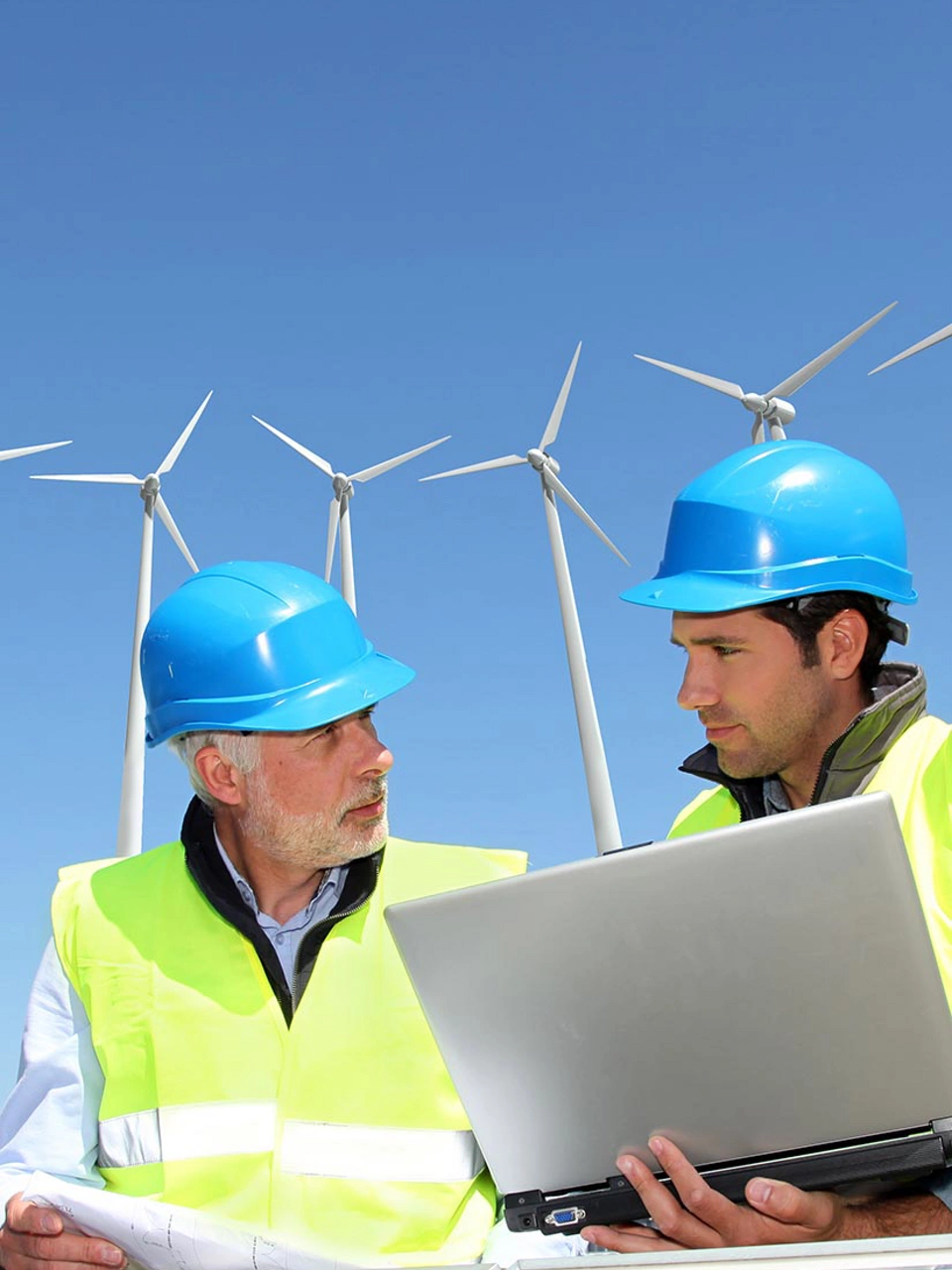 Group of engineers meeting on building roof