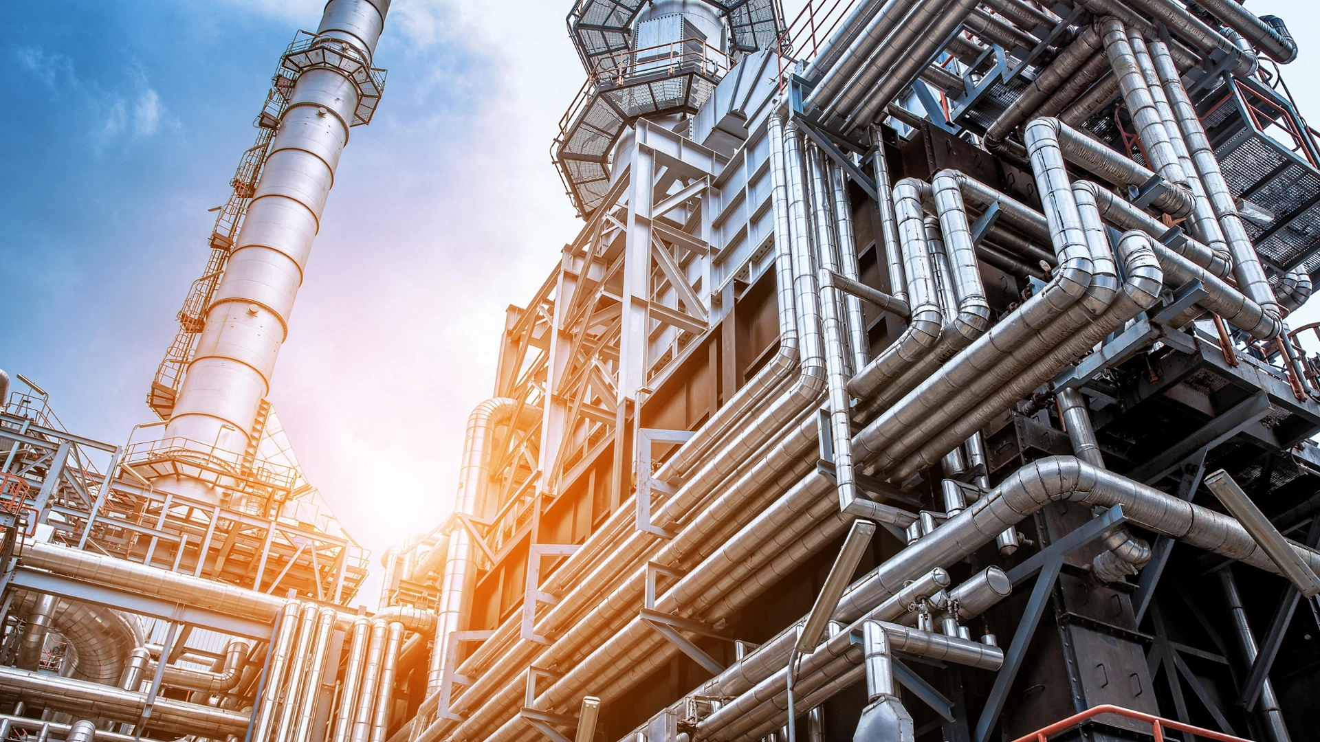 Close up Industrial view at oil refinery plant form industry zone with sunrise and cloudy sky.