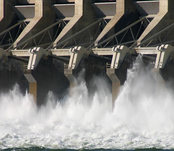 Water spills from a dam creating electricity.